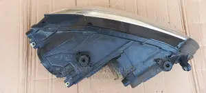 Volkswagen Jetta (Mk6) Left Nonxenon Headlight Assembly