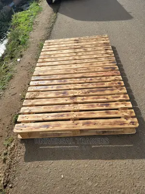 Simple Pallet Bed With Torched Patterns
