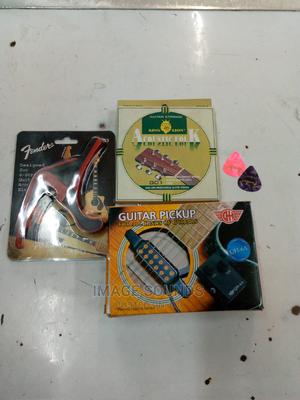 Guitar Pickup With Capo, Strings and 2 Picks - thumbnail 2