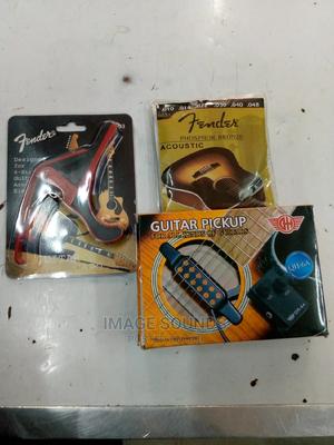 Guitar Capo, With Guitar Pickup and Fender Strings - thumbnail 2