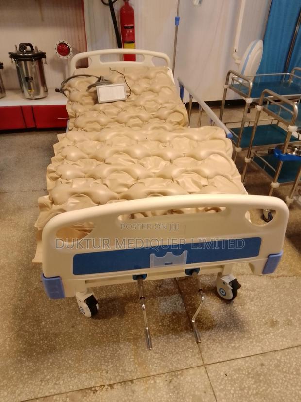 2 Crank/ Two Function Manual Hospital Bed With Ripple Matres - main view