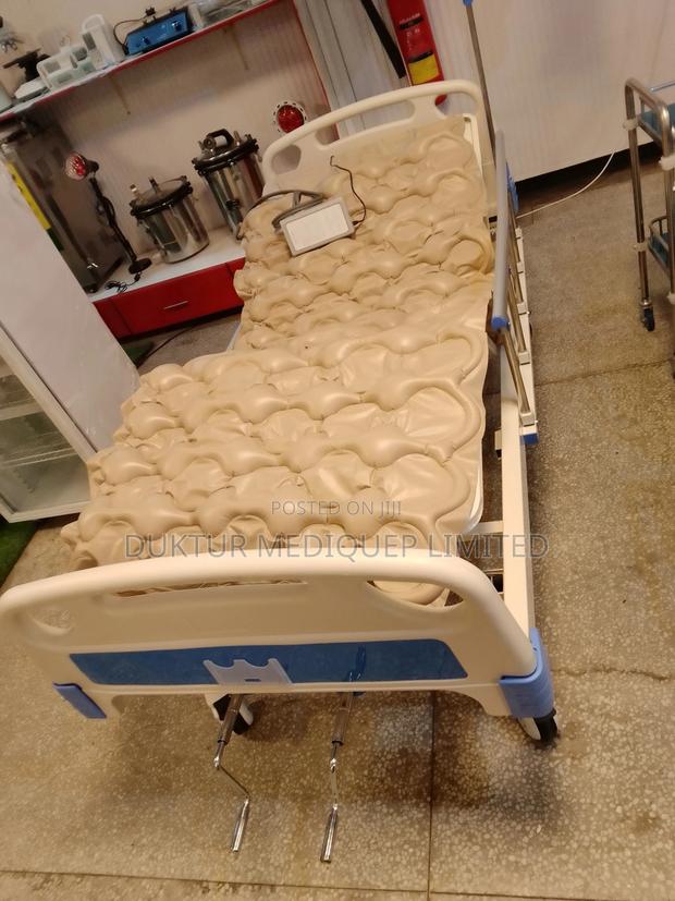 2 Crank/ Two Function Manual Hospital Bed With Ripple Matres - thumbnail 3