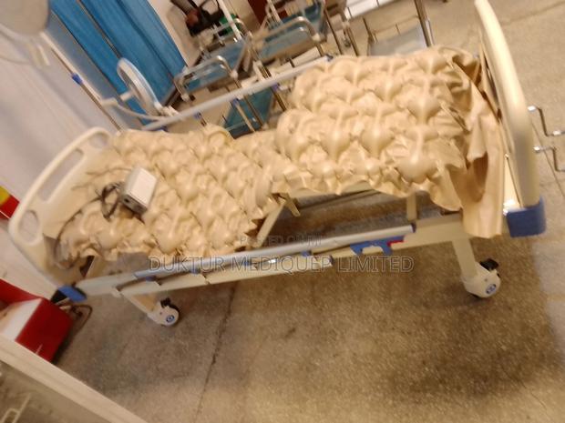 2 Crank/ Two Function Manual Hospital Bed With Ripple Matres - thumbnail 4