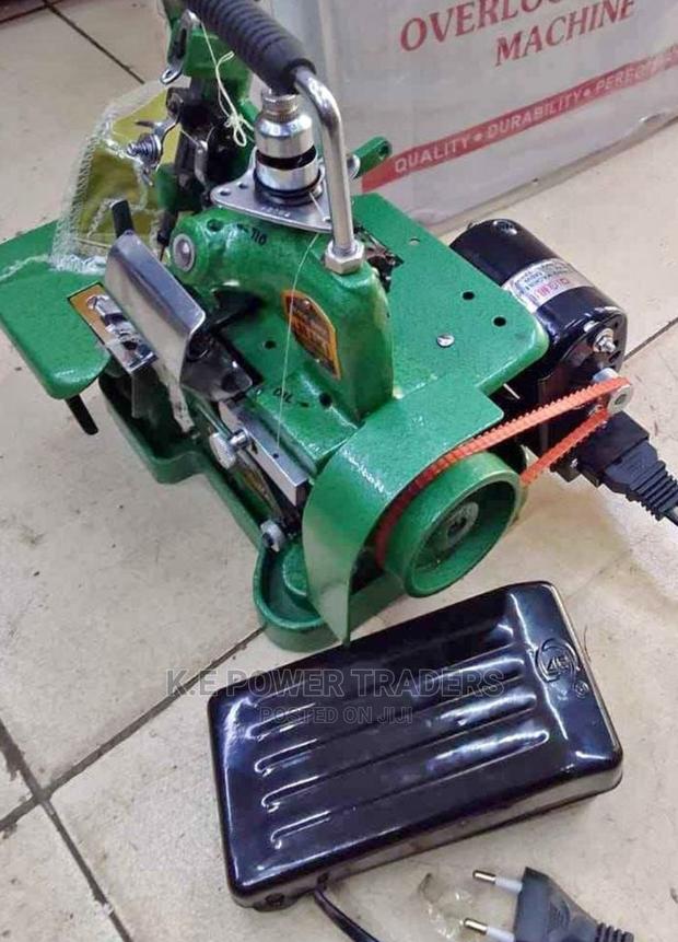 Electric/Manual With Motor Overlock Sewing Machine - main view