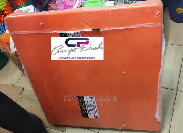 Orange Plastic Table With Metallic Legs. - main view