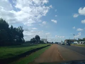One Acre Langas Touching Tarmac With Title