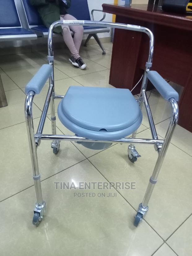 Foldable Portable Commode Chair With Wheels - thumbnail 2