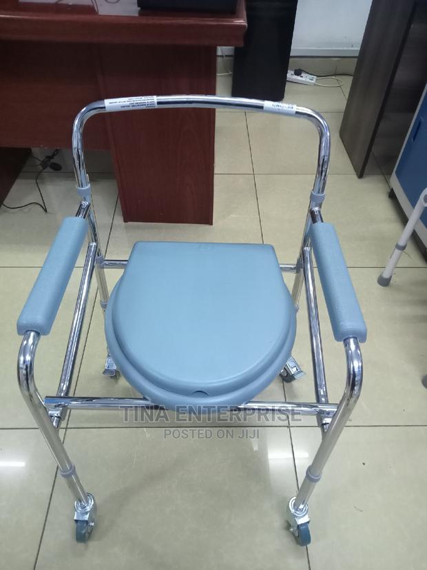 Foldable Portable Commode Chair With Wheels - thumbnail 3