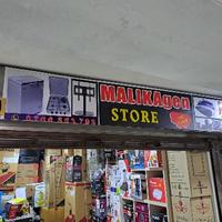 MALIKAGEN STORE logo