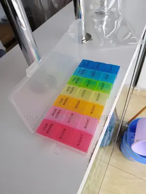 7-Day and Three Times a Day Colored Plastic Pill Organizers