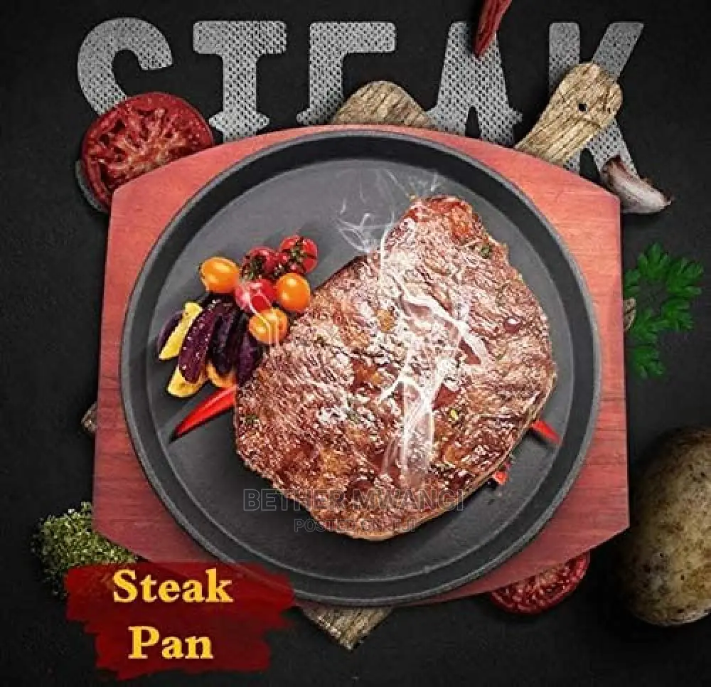 Cast-Iron Hot Sizzling Plate on Wooden Tray in Kenya