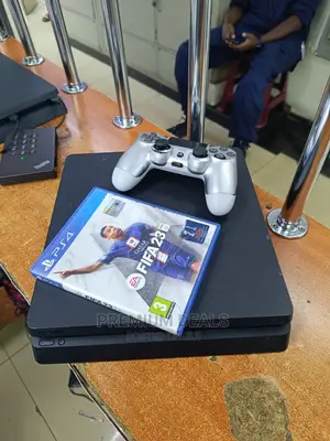 Slightly Used Slim Ps4 Plus Fifa and Its Controller