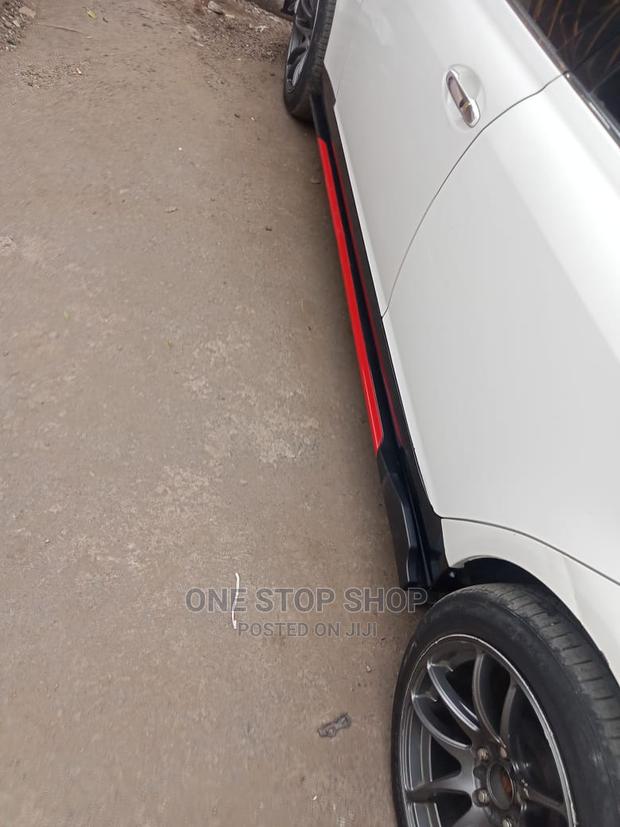 Saloon Car Fitted With Adjustable Side Skirts Black_red - thumbnail 2