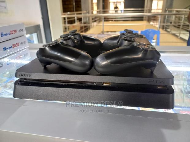 Ps4 Slim With Two Pads