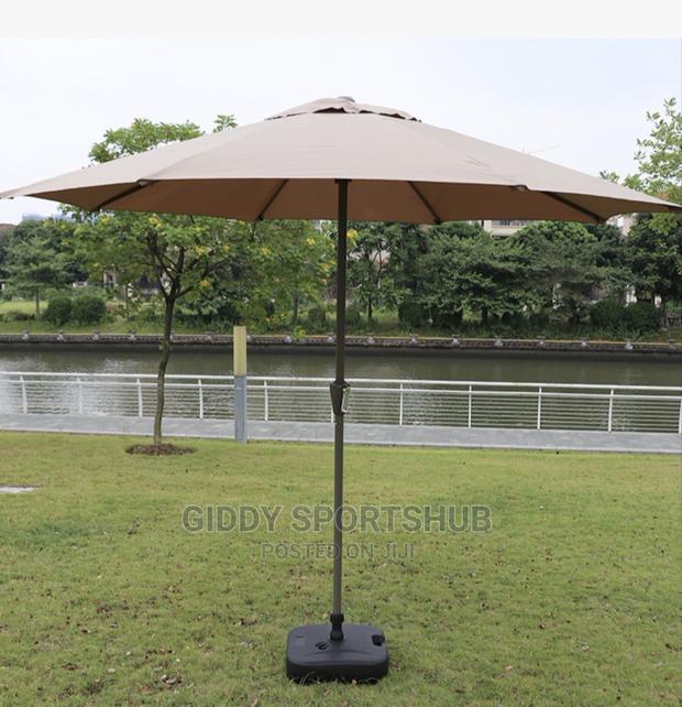 Folding an Outdoor Umbrella With an Iron Pipe - thumbnail 2