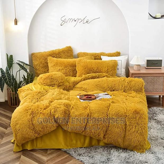 Yellow Fluffy Duvet With 1 Bedsheet and 4 Pillowcases