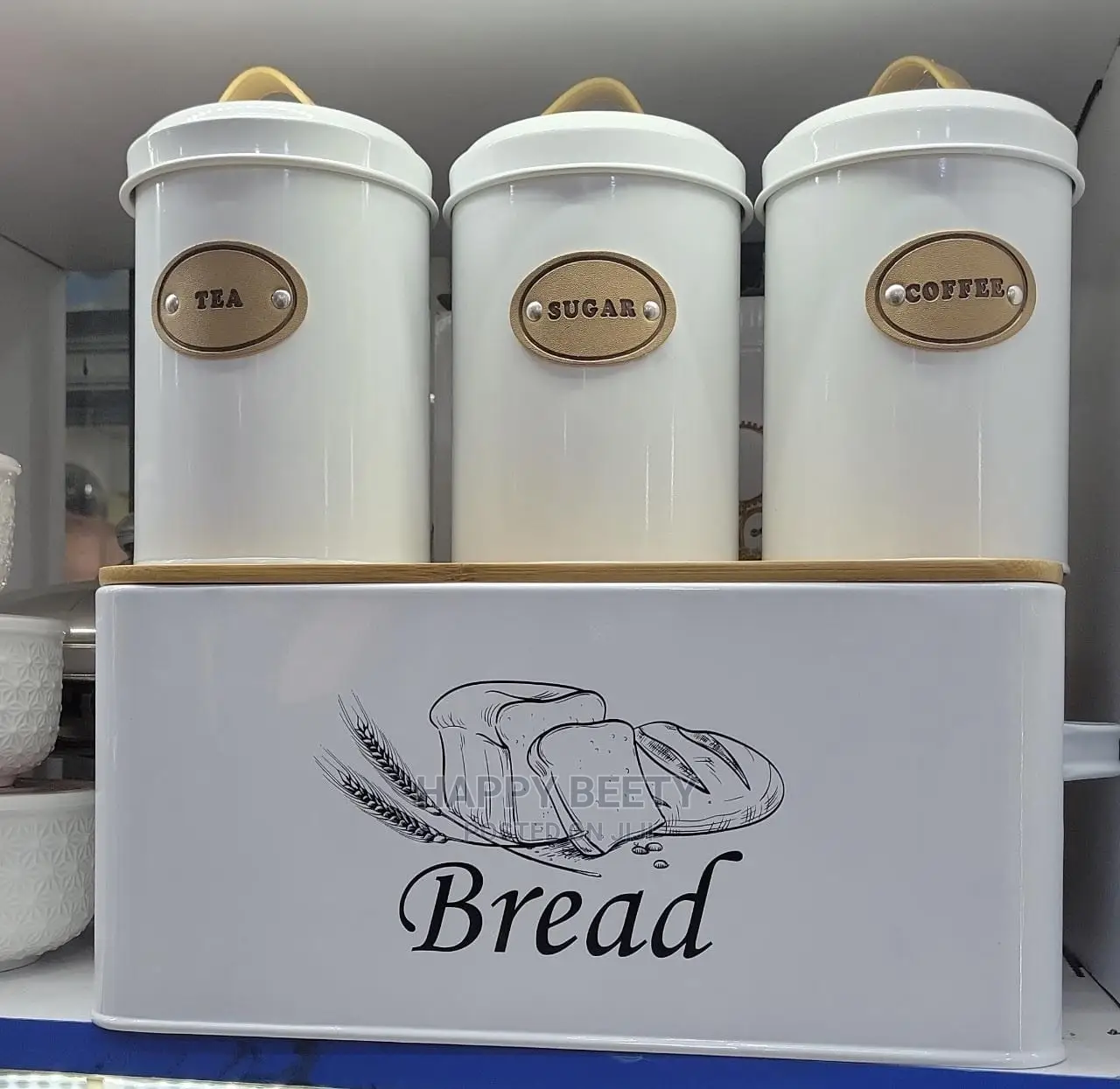 4pcs Bread Bin Set, 
1 Bread Box.
3pcs Cannister