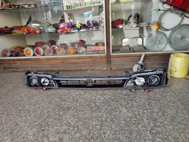 Toyota Corolla Headlights Aftermarket Includes Grill Set