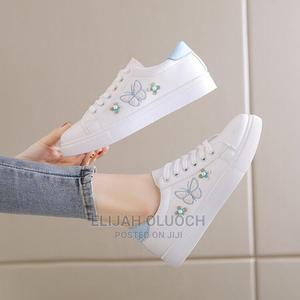 Lady's White Sneakers - thumbnail 2