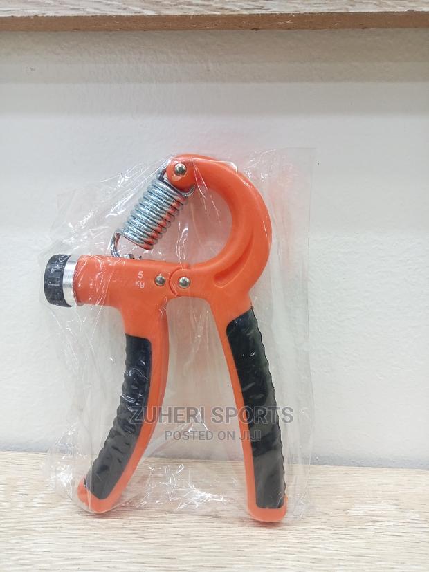 Handgrip Exerciser Orange/ Fist, Grip & Wrist Strengthening