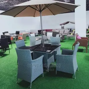 Beige Umbrella Plus a 4 Seater Garden Set
