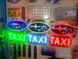 Subaru Emblems /Taxi Lights and Other Assorted Accessories