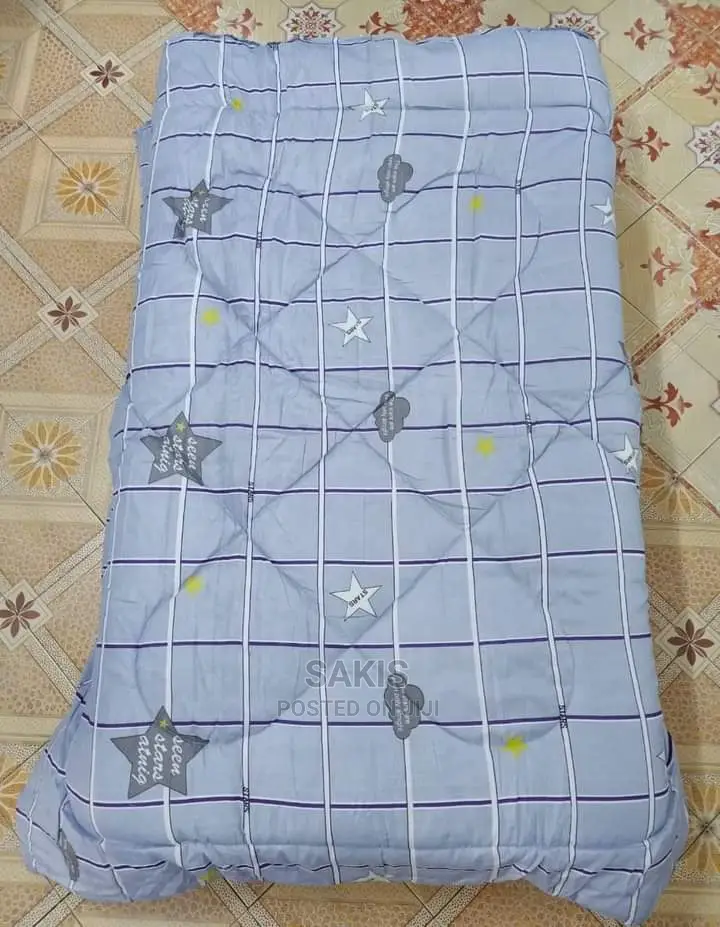 Warm 5 by 6 Duvets+ Sheet and Pillow Cases. Free Delivery