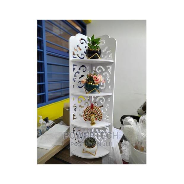 White Triangular 4 Layer Corner Shelf.
