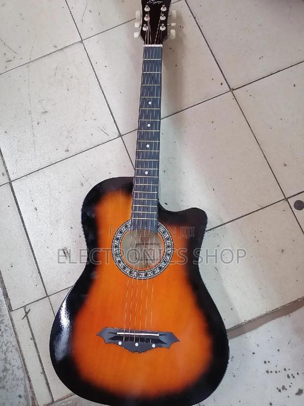 Size 38 Box Acoustic Guitar.