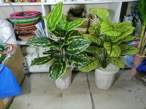 Plant Artificial Offer With Plastic Vase and Pebble Stones