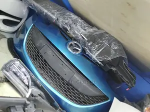 Mazda Demio Genuine Nosecut