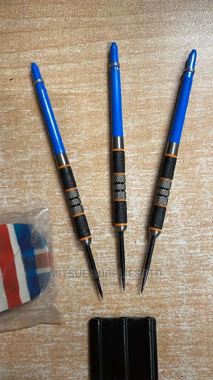 A Set of Tungsten Darts With Leather Wallet and Flight