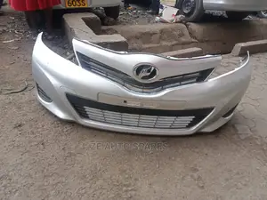 Pearl White Vitz 2013 Front Bumper Available
