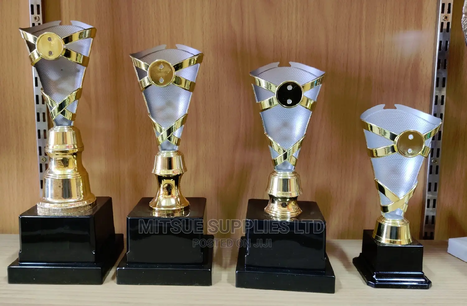 A Set of 4 Trophy Set for Awarding- School (20,25,27,30cm)