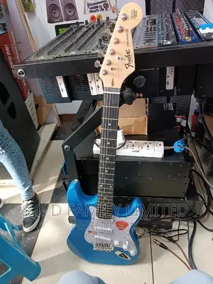 Blue Fender Rythmn Electric Guitar
