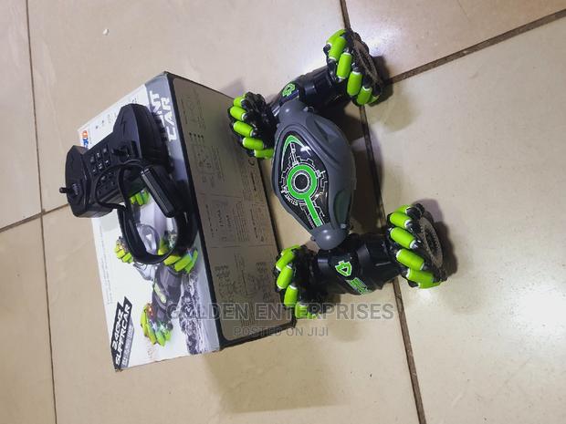 Green Rc Stunt Car With Hand Gesture Control and Controller - main view