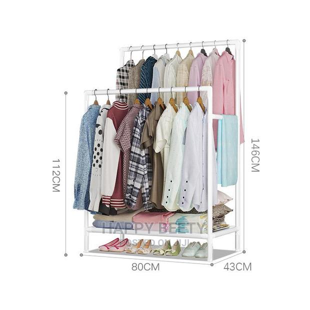 *Double Pole Clothing Rack With Lower Storage Tier - main view