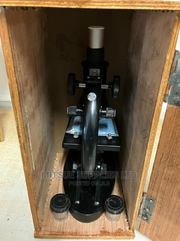 Budget Monocular Microscope Screwed In A Wooden Case - main view