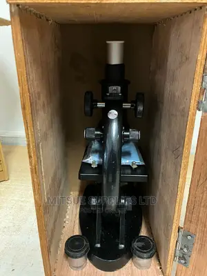 Budget Monocular Microscope Screwed In A Wooden Case