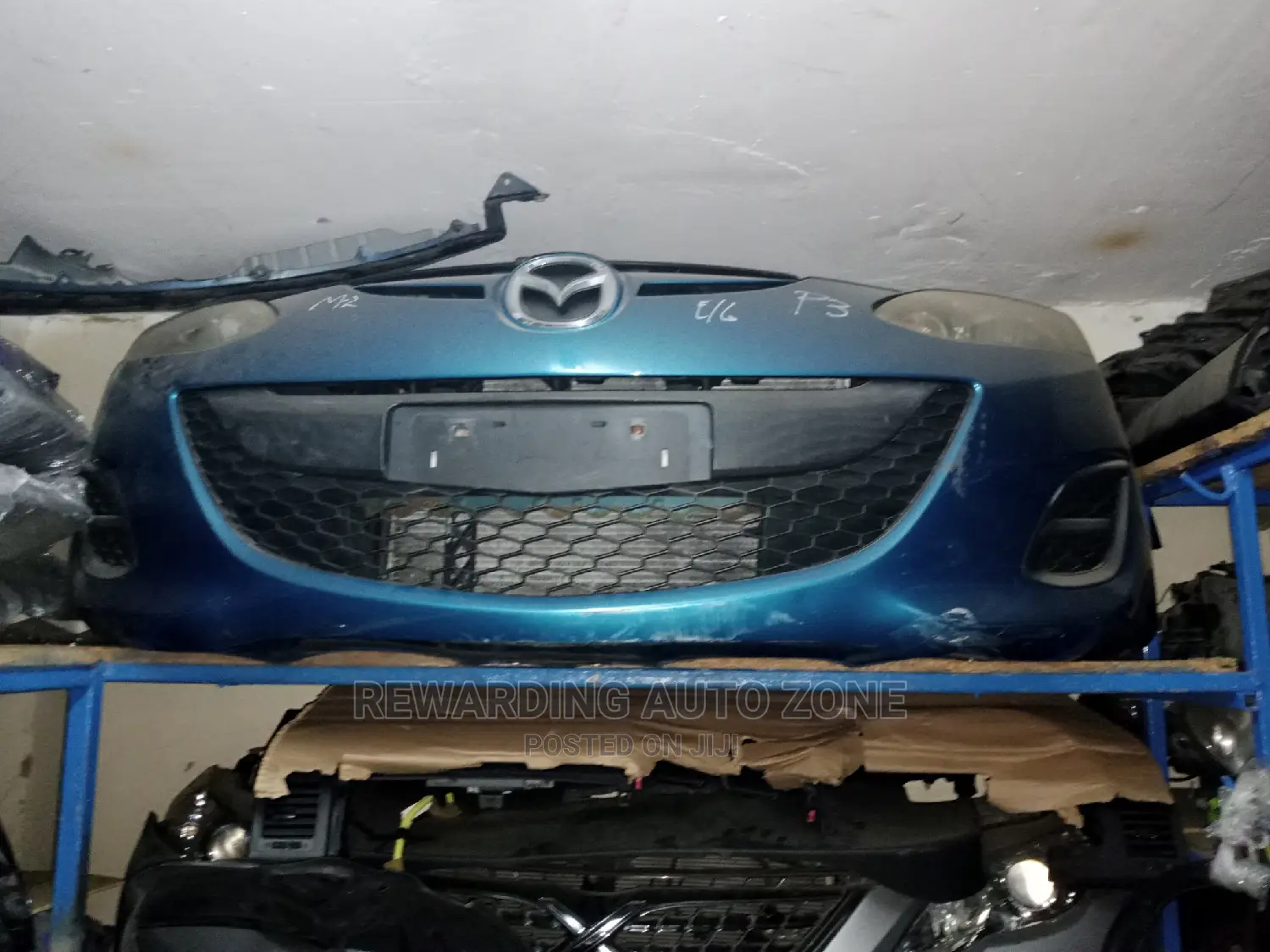 Mazda Demio 2012. Nosecut With Non Xenon Bluesh Headlights.