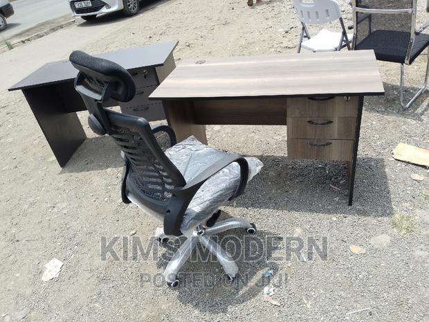 Office Desk Size 1.2 Metre American Walnut + Headrest Chair. - main view