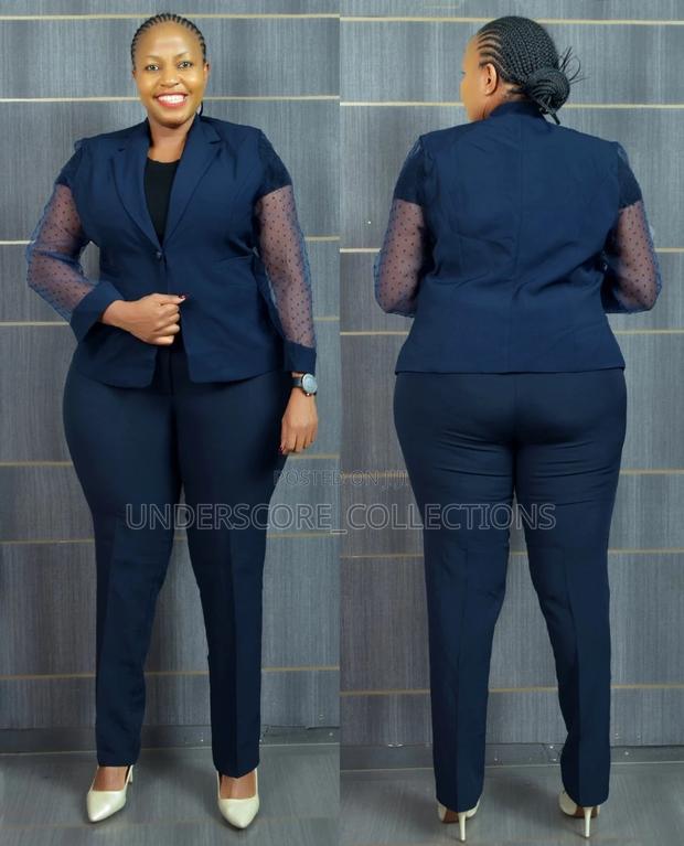 Classy Ladies Trouser Suits With Netted Arms