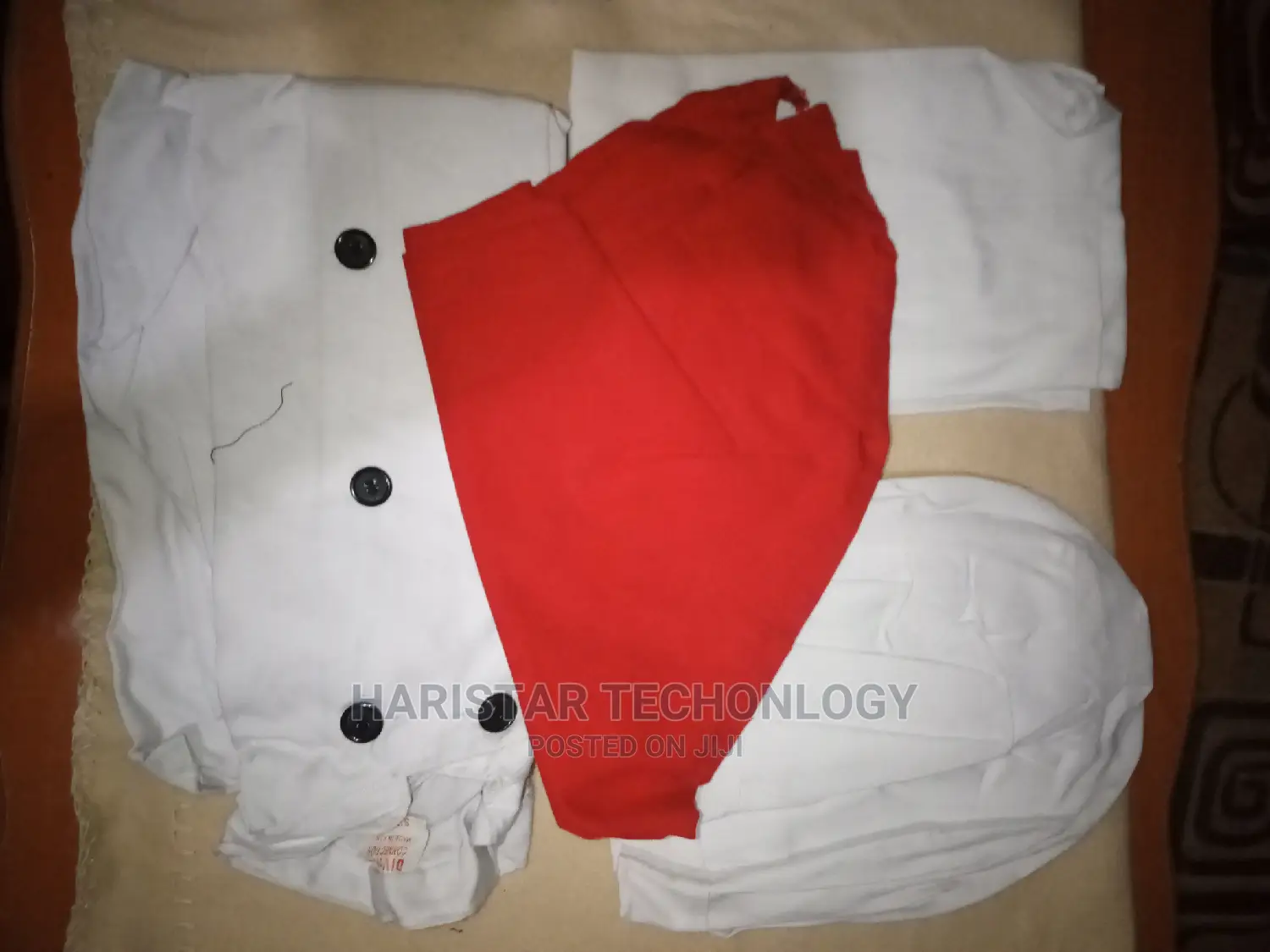 A Set Of Chef Jacket ,Apron,Chef's Hat And Chef's Tie