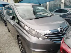 Mazda Biante 2016 Gold