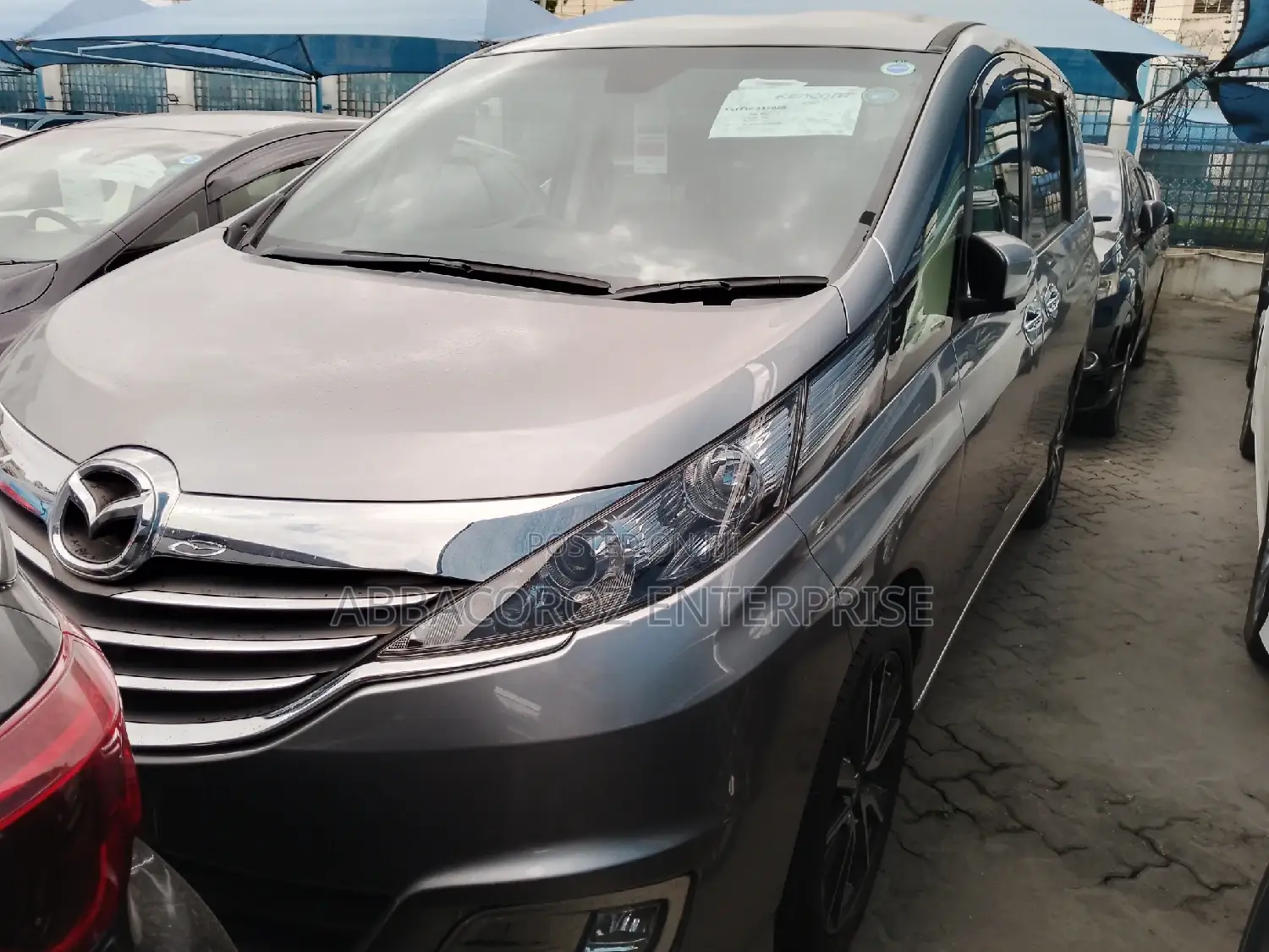 Mazda Biante 2016 Gold