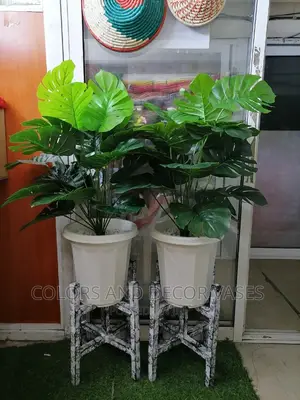 Plant Artificial, Plastic Vase With Stones and Wooden Stand