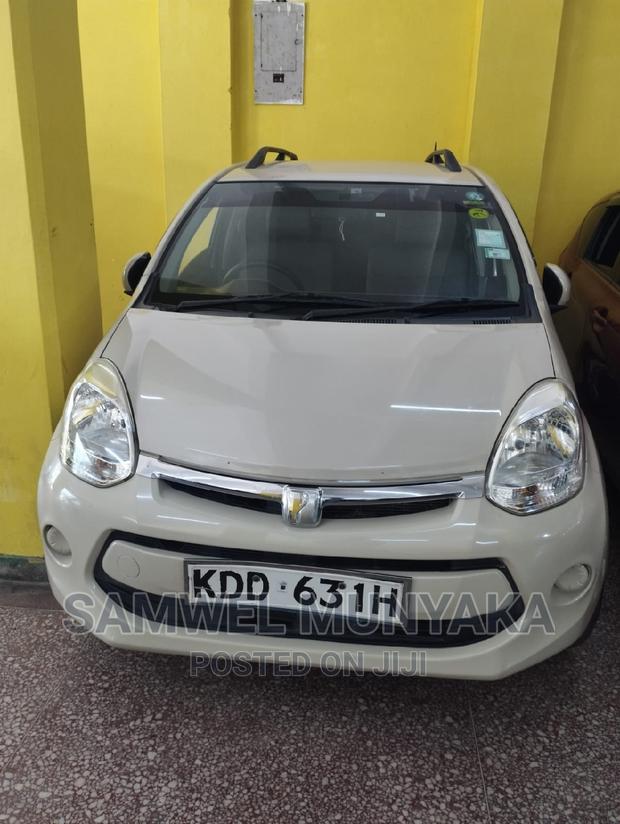 Toyota Passo 1.0 AWD 2014 Beige - thumbnail 4