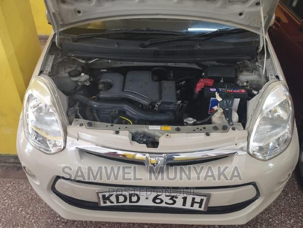 Toyota Passo 1.0 AWD 2014 Beige - thumbnail 7