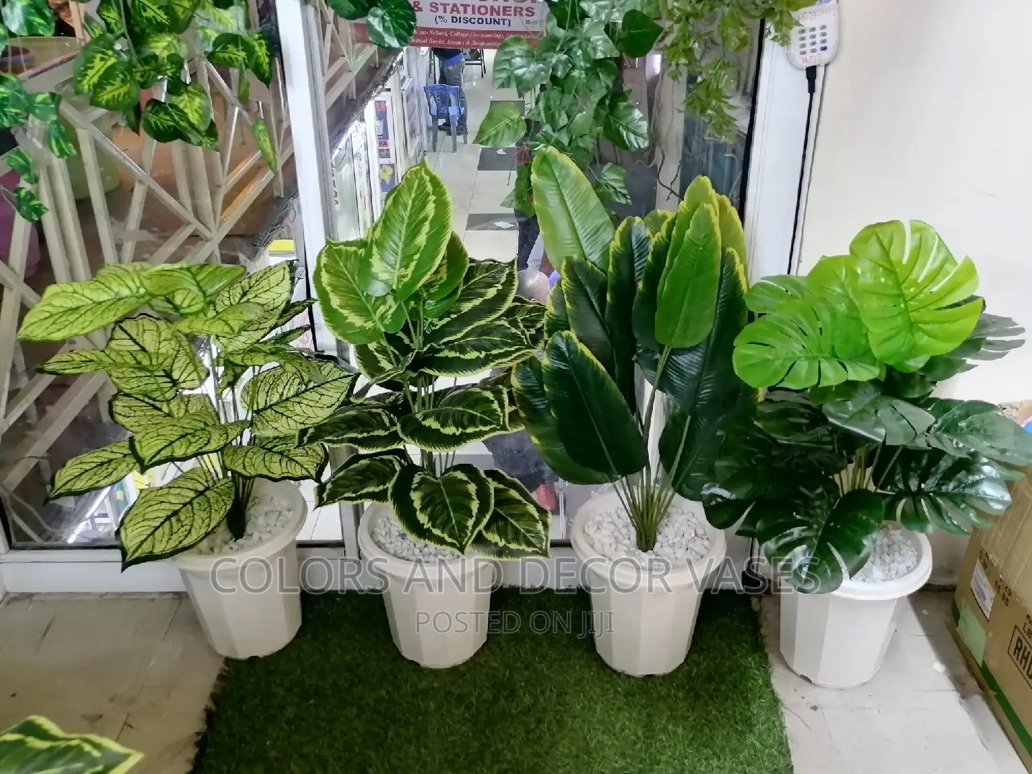 Plants With Plastic Vase and Pebble Stones