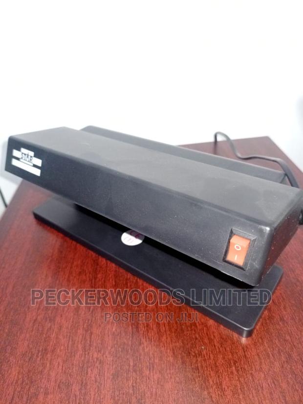 Portable and Inexpensive Money Detector